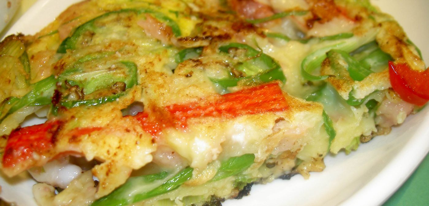 Haemul-pajeon. The batter is only there to hold the spring onion and seafood together.
